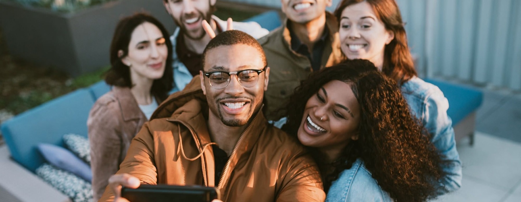 a group of friends taking a picture